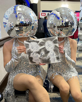  Marty Macaluso Long Island trade show caricatures April 2022 2 flapper girls wearing crystal ball heads